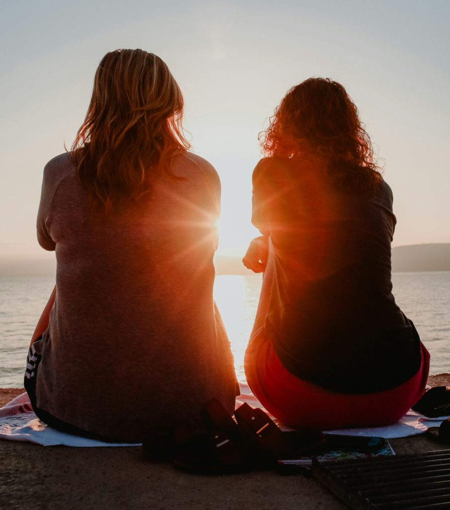 two women sitting together